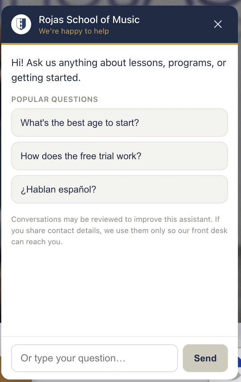 Rojas School of Music chatbot welcome window with suggested questions and message input